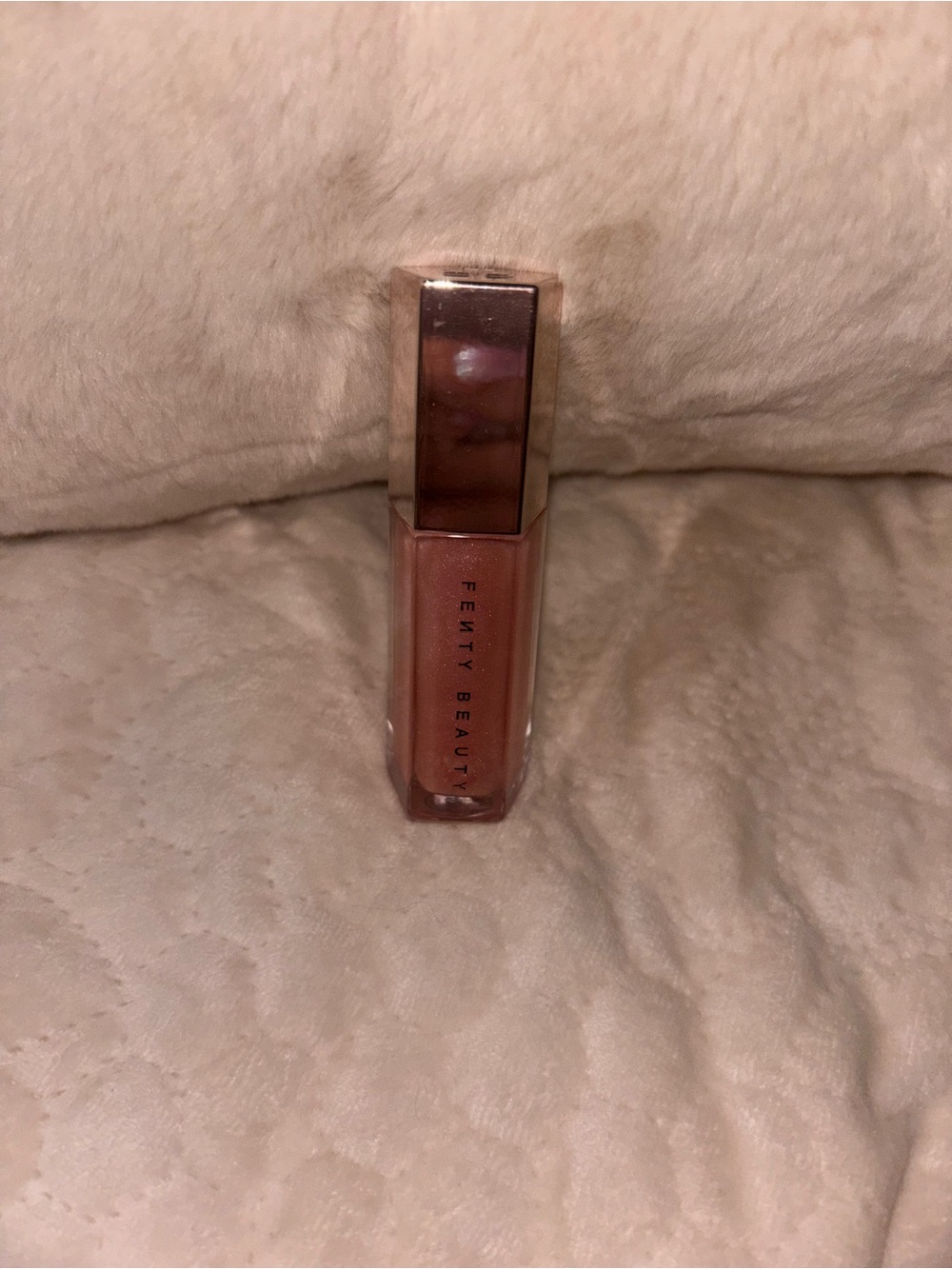 Never used Fenty Beauty Gloss Bomb in the shade sweet mouth